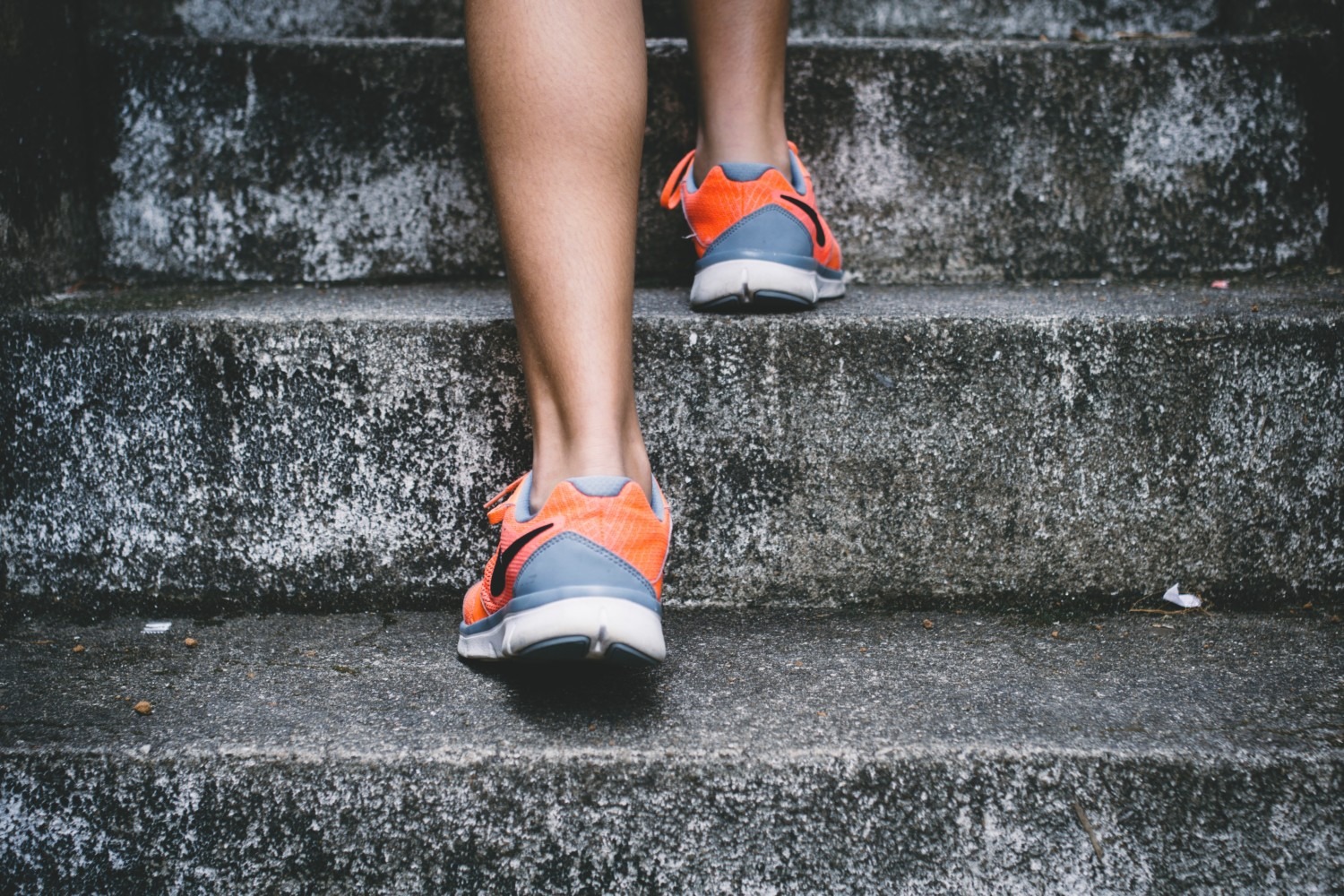 Image of feet walking up steps