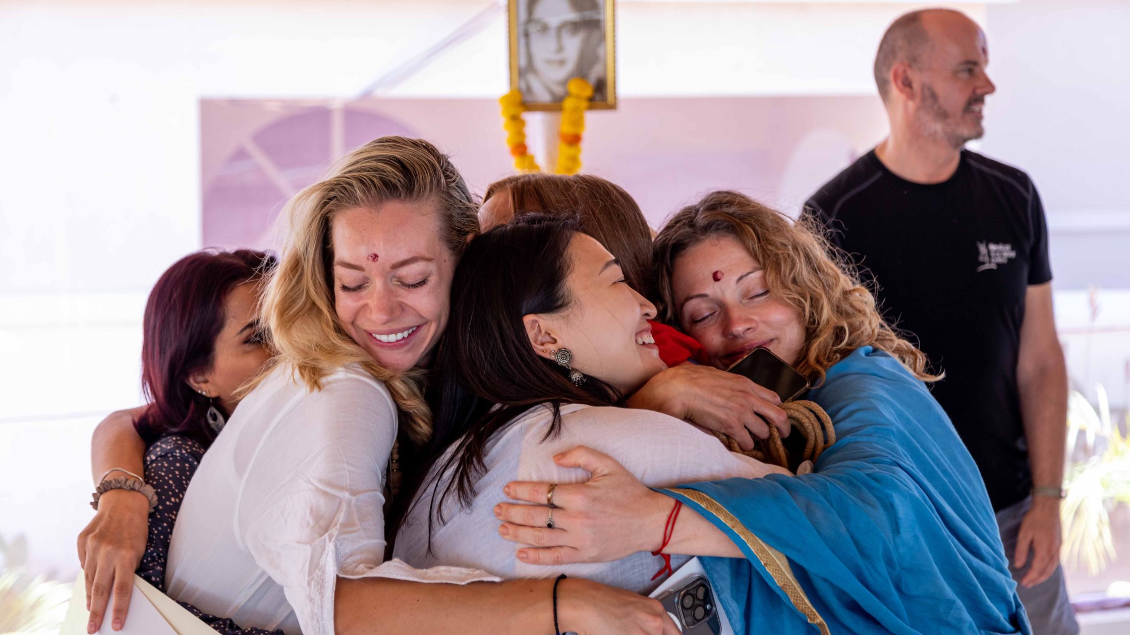 Happy yoga students and teachers after class at Himalaya Yoga Valley retreat centre in India