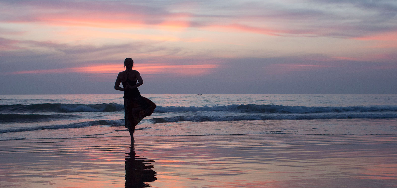 yoga student practicing tree pose in Goa